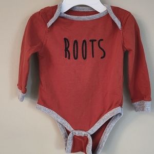 Roots burnt orange long sleeved onesie/bodysuit